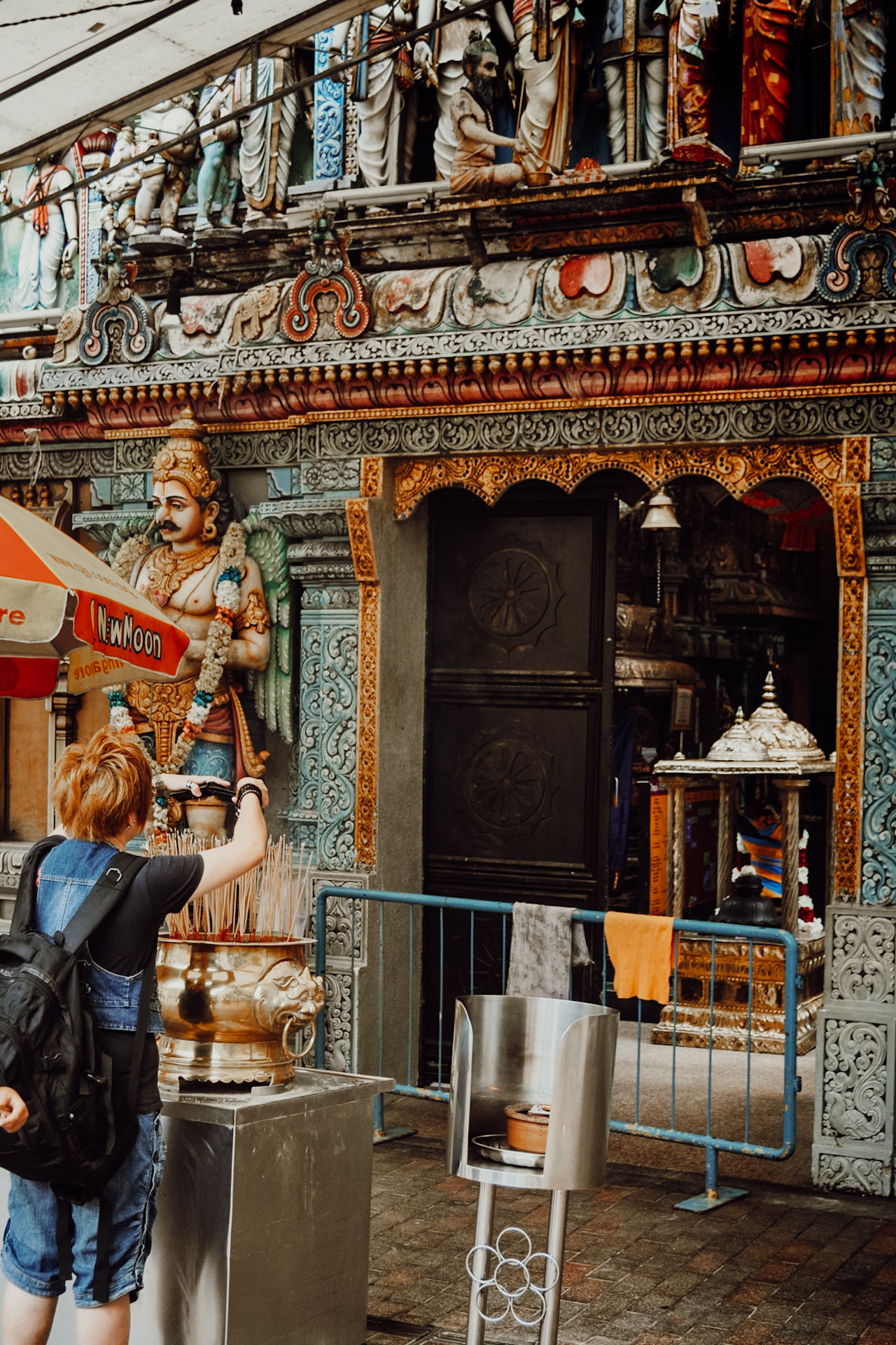 A Buddhist cencer in front of a Hindu temple - a unique thing to see in Singapore