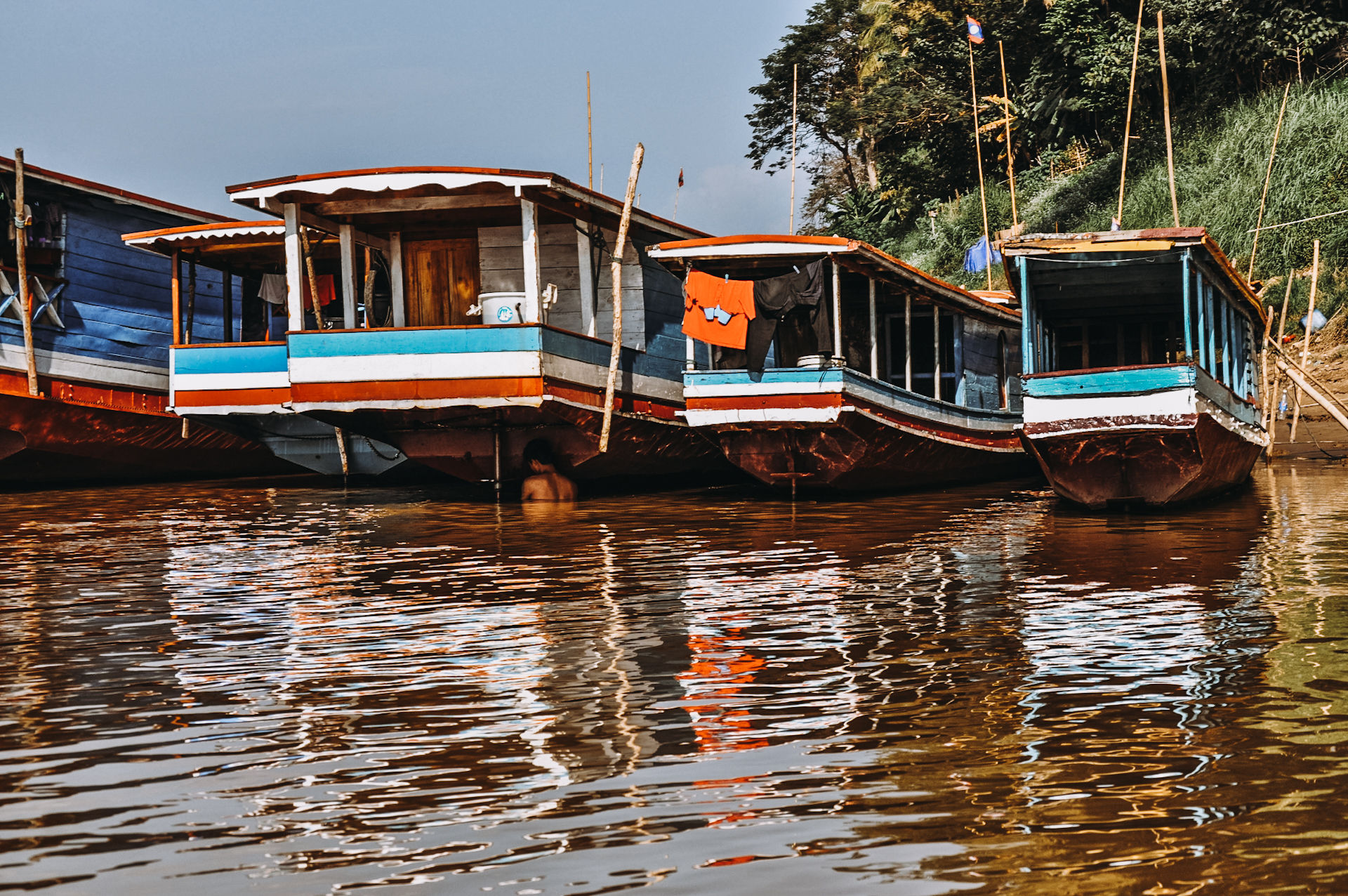 Slowboats on my Laos itinerary // Slowboats auf meiner Backpacking Laos Route